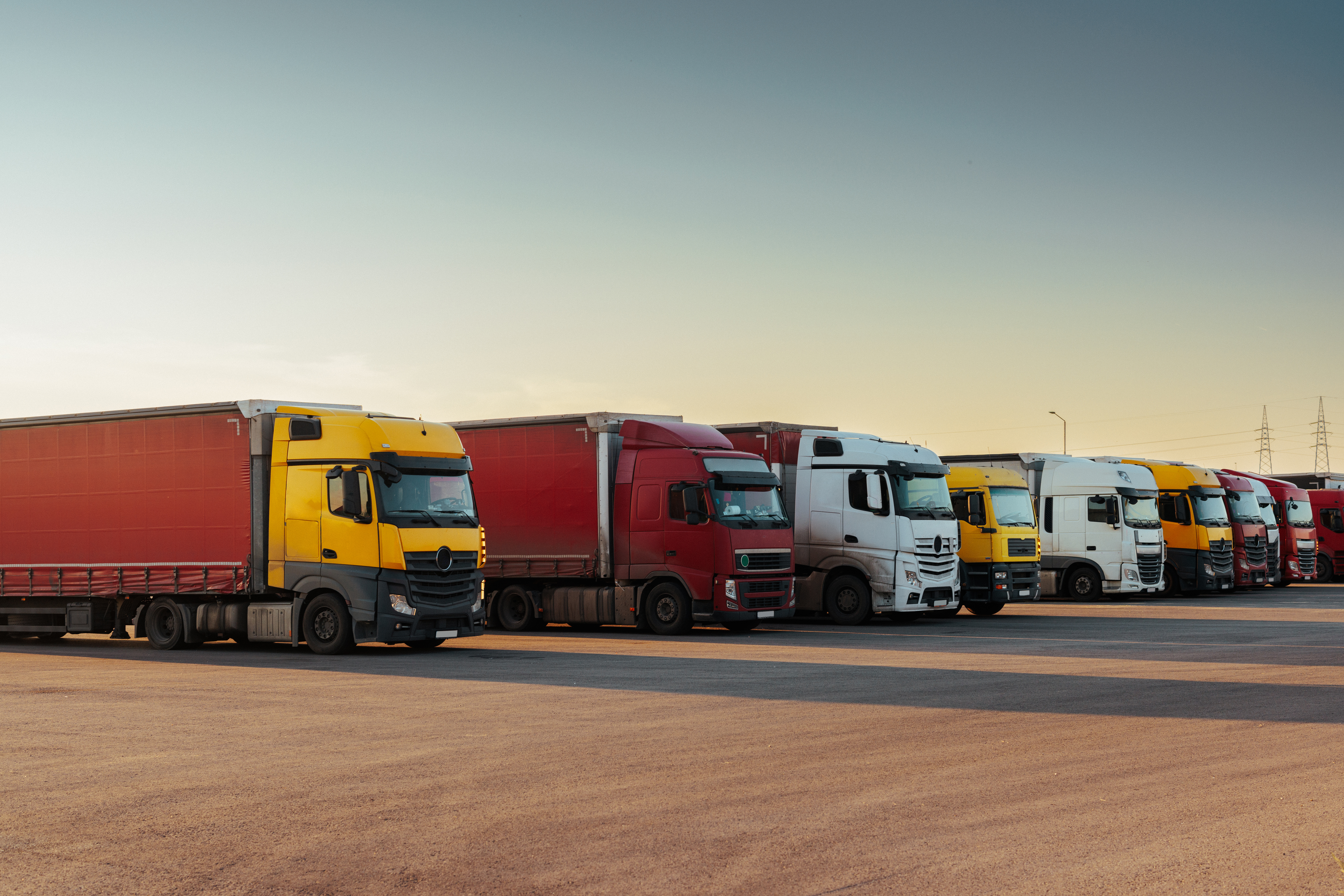 Freightliners in company storage lot.